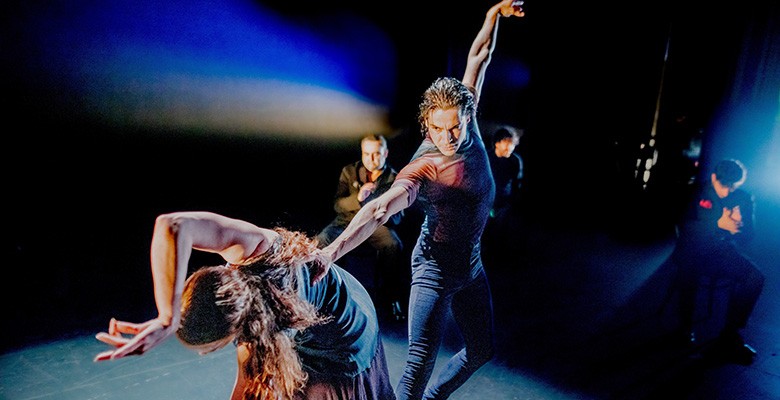 Photo of male and female dancers of Noche Flamenco in action