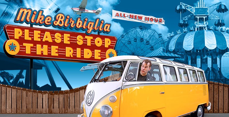 Image of Mike leaning head out of a VW bus with carnival rides in background