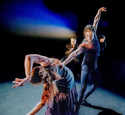 Photo of male and female flamenco dancers performing