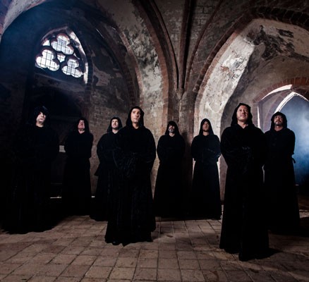 Monks of the Gregorian Pure Chants standing in a gothic church